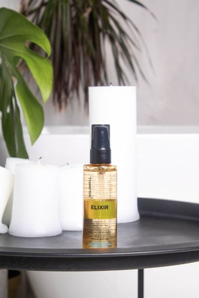 Олія-флюїд для всіх типів волосся Goldwell Elixir 205015 фото